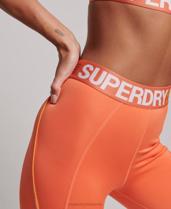 Superdry jambiere strânse elastice cu marca trenului îmbrăcăminte portocale femei JX0Z4062