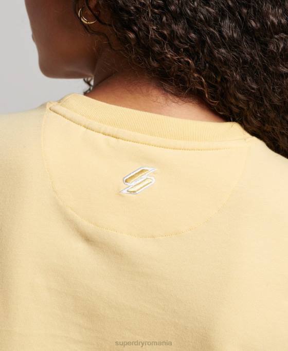Superdry tricou grafic anilor 90 îmbrăcăminte galben femei JX0Z2667